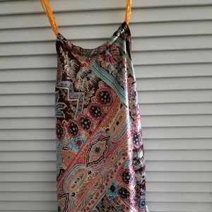 Brown patterned top with orange beaded neckline